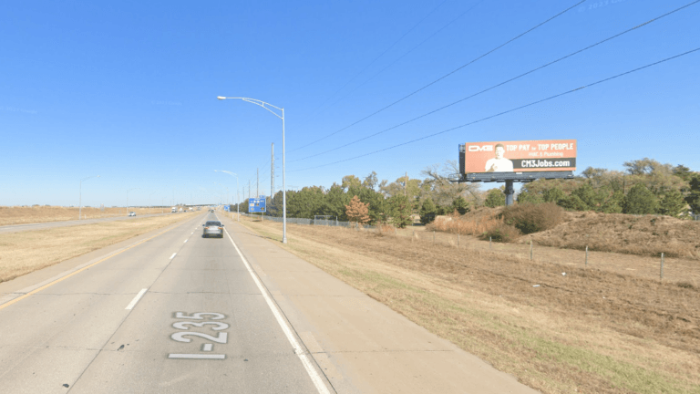 South facing static billboard on I-235, 1-2 blocks south of Kellogg.
