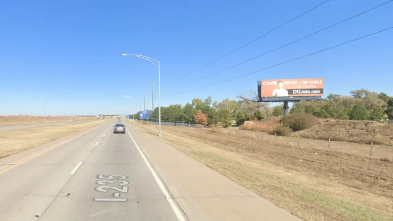 South facing static billboard on I-235, 1-2 blocks south of Kellogg.