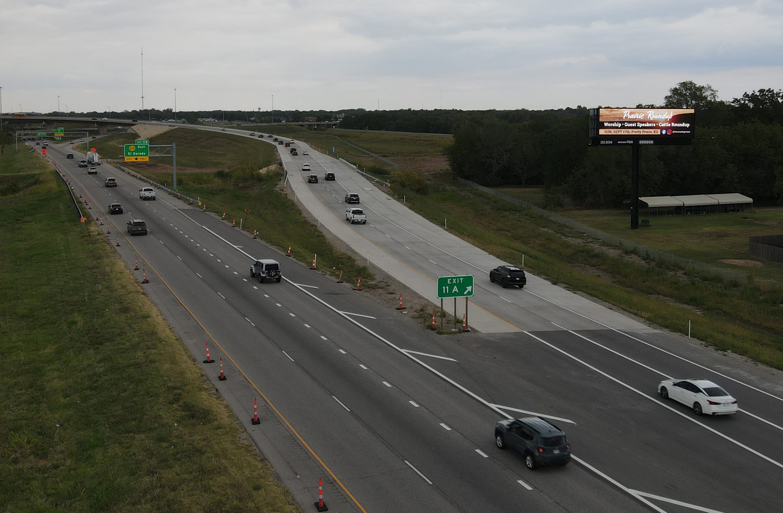 South facing digital billboard on I-135 & K-96 Highway, near exit 11A.