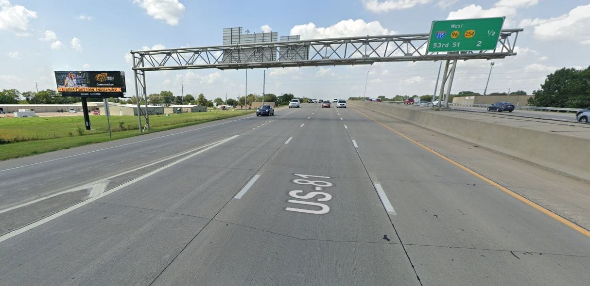 South facing digital billboard on I-135 & K-96 Highway, near exit 11A.